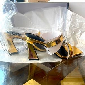 Brand new never been worn Nine West fun gold slide heels